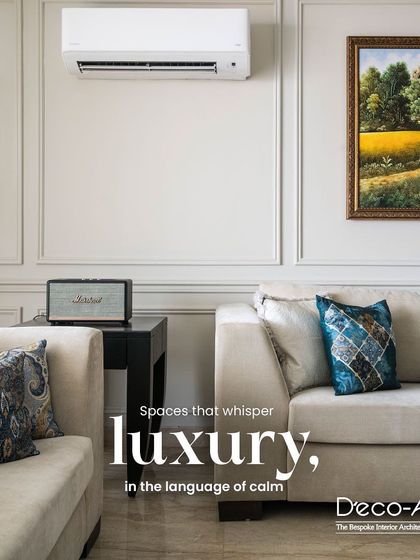 I design spaces that whisper luxury in the language of calm. This living room uses a neutral palette, comfortable sofas, and touches of blue to create a sanctuary of serenity and style.