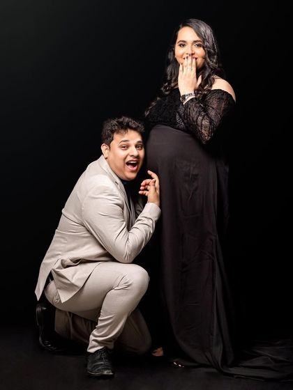 A playful studio shot capturing the dad-to-be's excitement. This is a duplicate image to ensure all media is included.