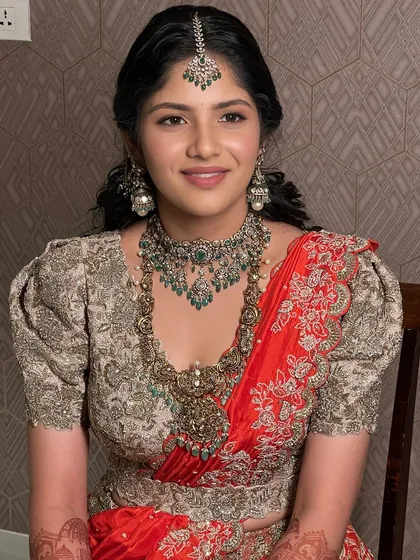 The half-saree ceremony is a cherished South Indian tradition. I will teach you how to create age-appropriate, elegant makeup for these special occasions, balancing youthful freshness with traditional aesthetics.