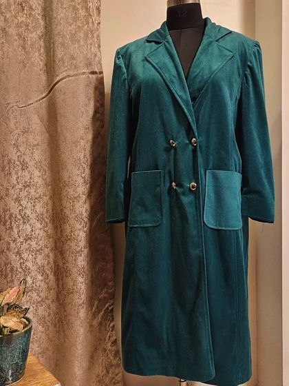 Wrap yourself in timeless elegance with our customizable suede coat. You can choose the style and design to make a statement that's uniquely you.