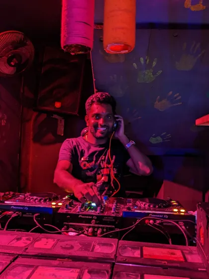 A shot from an intimate pub gig. Even in smaller venues, I bring my full energy, reading the crowd and playing the tracks that I know will get people smiling and dancing.