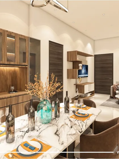 The dining table is where memories are made. In our 'Majestic Fortune' project, we created an open, inviting dining and living area that balances modern needs with traditional warmth, perfect for family gatherings.