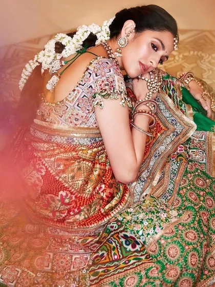 This is one of my all-time favorite looks. We created this custom Anamika Khanna lehenga for a special event, focusing on rich, vibrant colors and intricate, traditional embroidery. It’s a celebration of heritage, designed to make the wearer feel absolutely regal.