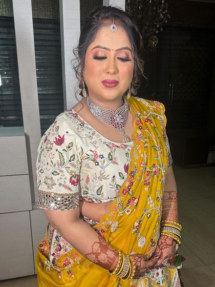 A beautiful look for a brother's wedding. The yellow and white lehenga is so festive, and I created a radiant makeup look to match.