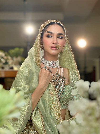 Another angle of the stunning traditional bridal look, showing how it catches the light and creates an aura of grace.