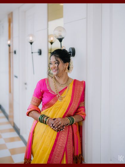 A stunning portrait of the bride, looking happy and relaxed on her wedding day.