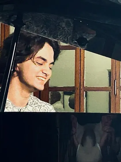 A candid shot of my son Ishaan, smiling at the piano during a concert at the Dutch Ambassador's residence. An absolutely amazing evening.