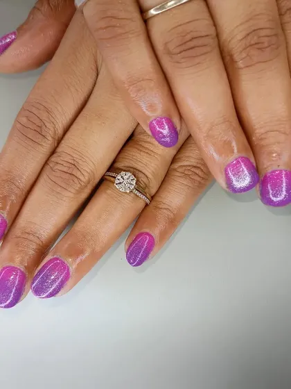 Another look at the sparkling purple and pink ombre nails.