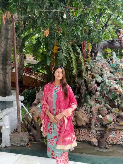 Another angle of my Sawan look, standing in front of a beautiful temple garden, feeling peaceful and connected.