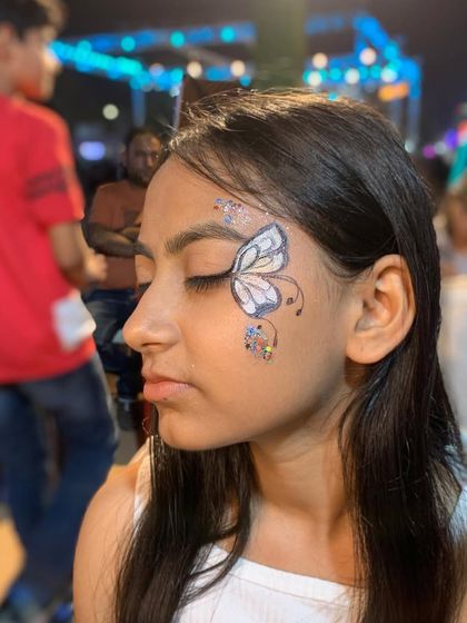 Whimsical Face & Body Art photo 18