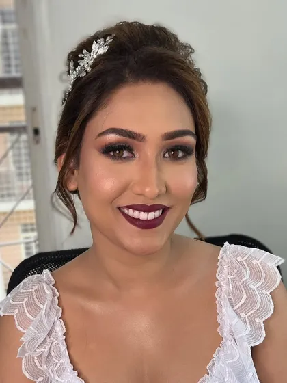 A happy, smiling portrait of the Christian bride, looking absolutely radiant and ready to walk down the aisle.