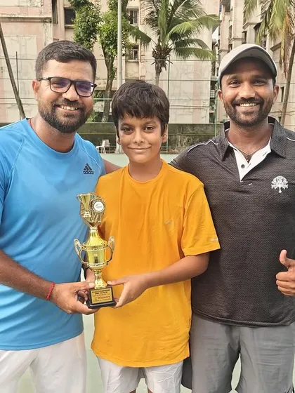 Abhinav Sharma with his coaches after winning the Under-16 All India Champions Series Doubles title in Punjab.