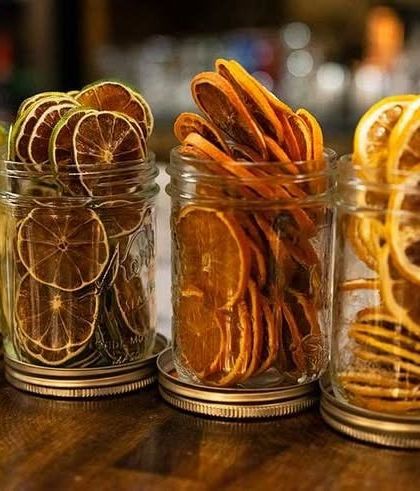 We store our dehydrated fruit garnishes in airtight jars to keep them fresh and crispy. It's this attention to detail that elevates a good drink to a great one.