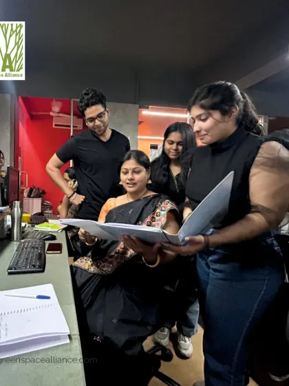 A group of our architects engaged in a design review. Our process is built on open communication and shared input, allowing us to turn creative ideas into thoughtful, buildable landscapes.