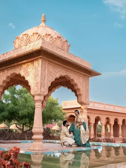 A playful yet regal moment by the water feature of the palace set. This photo shows that even in a grand setting, we can capture fun and candid interactions.