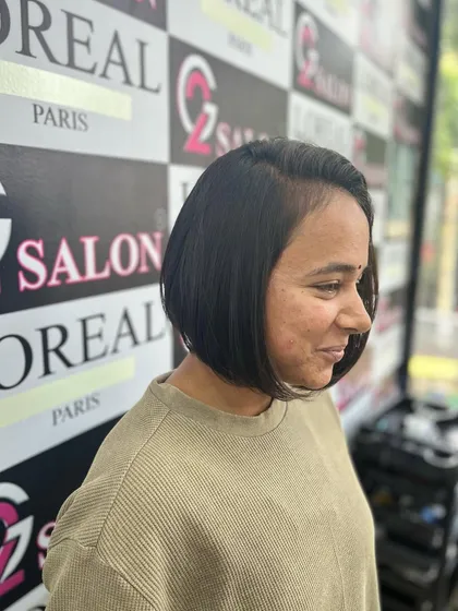 A side view of the classic bob cut, showing the clean line and how it beautifully frames the jawline.