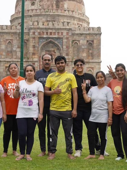 A happy group of our members posing at Lodhi Garden during our annual yogic picnic.
