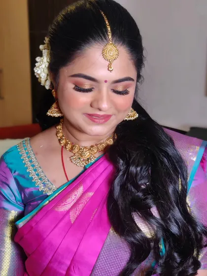 A close up of Pavitra's eye makeup. We went for a soft, shimmery look that brightened her eyes without being too heavy.