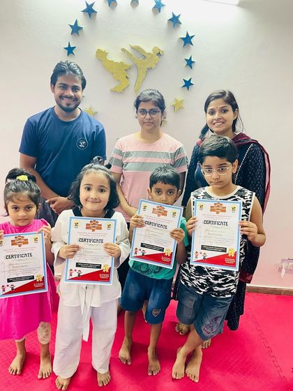 Distributing certificates at our summer camp. It was a great experience for all the kids, filled with learning and fun.