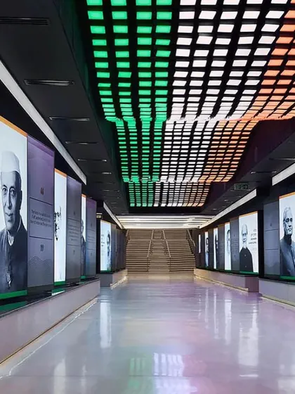 The interior of the museum, featuring a dynamic ceiling with lights representing the Indian flag. This space was designed to be immersive, using technology and architecture to tell a story.