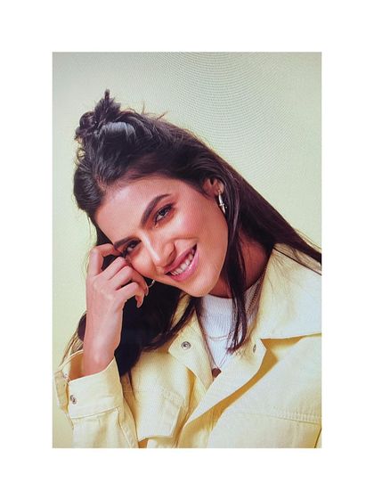 A fresh and youthful look for an Oriflame campaign. I used a pastel yellow jacket and a casual half-bun hairstyle to create a relatable, girl-next-door vibe.