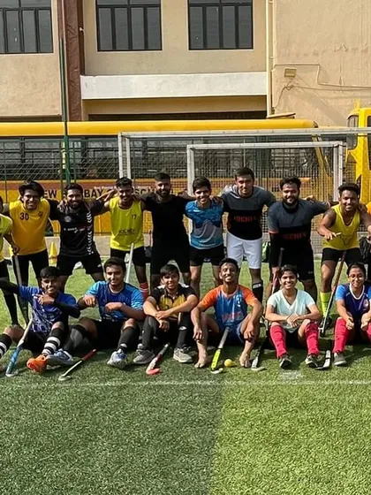 A fun group photo with our players after a sunny practice session. The smiles say it all.