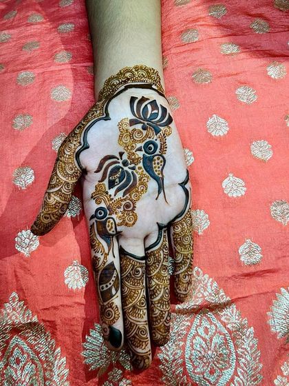 A still shot of the modern bird and lotus design. The use of negative space makes the motifs stand out, creating a light and airy feel.