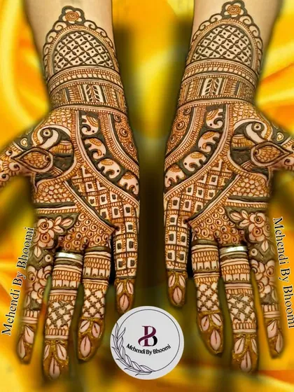 A classic bridal design with peacocks and elephants. The bold lines and clean patterns create a timeless look that is perfect for any bride.
