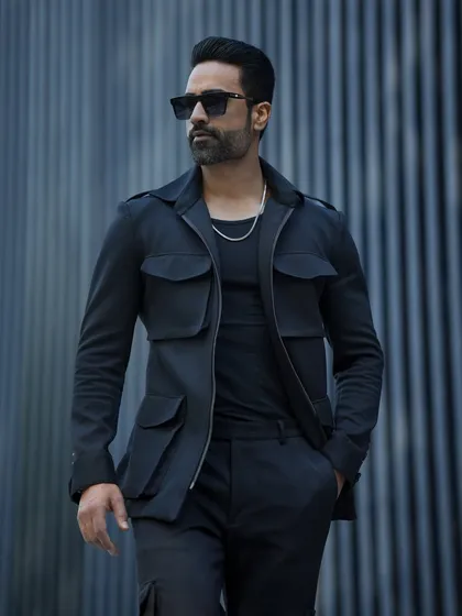 Our GT Tracksuit in black, featuring a stylish four-pocket jacket. This is not your average tracksuit; it's a statement in luxury casual wear.