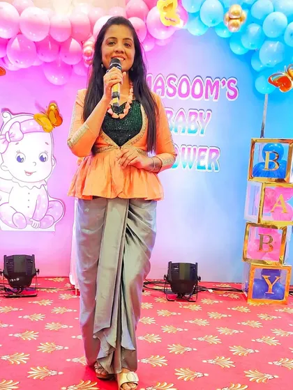 On stage at a lovely baby shower for mom-to-be Masoom. The colorful 'Boy or Girl' theme with cute baby blocks added to the festive and cheerful atmosphere.