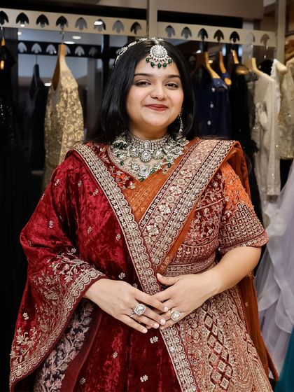 A complete bridal look, from the rich velvet lehenga to the statement matha patti. I help you style your entire look for a cohesive and royal feel.