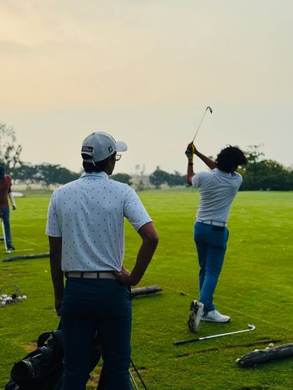 Our coaches are constantly on the range, providing hands-on instruction. From demonstrating a swing path to analyzing a student's setup, these moments of direct mentorship are where real progress is made.