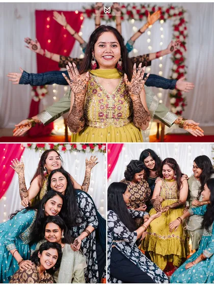 The Mehandi ceremony is a perfect time for fun photos with the bridesmaids. This creative pose showcases the bride's henna while celebrating her friendships.