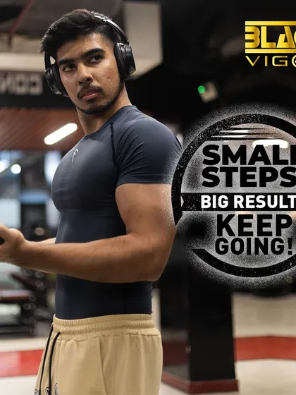 Every small step contributes to big results. This member is focused during a cable bicep curl, demonstrating the consistency and dedication that our personal training programs are built upon. Keep going!