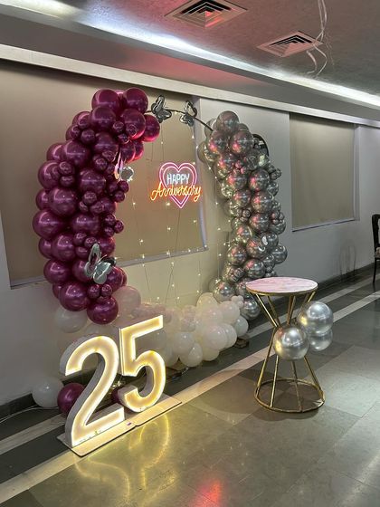 This angle shows how the neon sign and marquee numbers glow, creating a beautiful ambiance for an evening celebration.