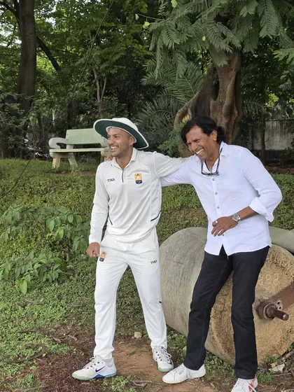 Sharing a laugh with Mayank Agarwal. The bond between a coach and a player goes beyond the pitch; it's about mentorship, trust, and a shared journey through the highs and lows of the sport.