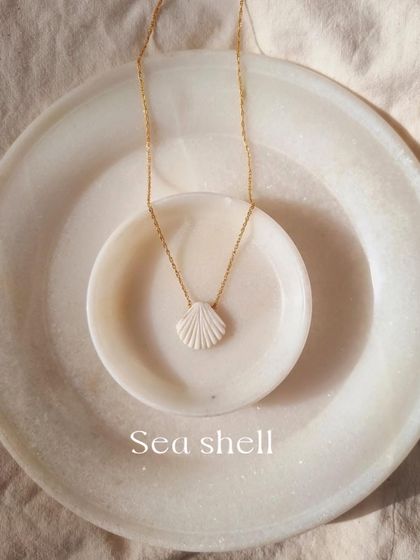 A simple, elegant shot of my 'saṅkha' Howlite Shell Pendant. The Howlite stone is a powerful tool for patience and calm.