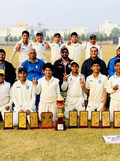 The complete U-14 championship squad with their parents and coaches. It takes a village to raise a champion, and our DCH family is proof of that.