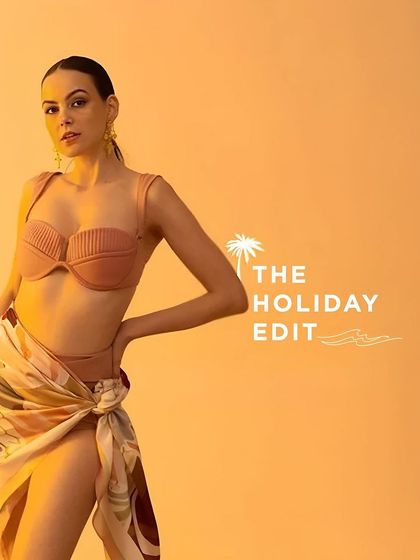 The campaign title card for Tizzi's "The Holiday Edit," featuring a model in a bikini and sarong.