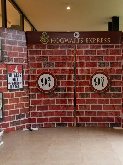 The iconic Platform 9 3/4 entrance, allowing guests to run through the brick wall and board the Hogwarts Express.