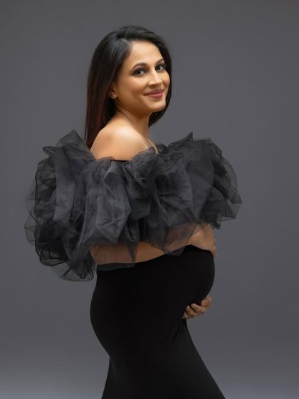 A close-up portrait that captures her happy and confident expression.