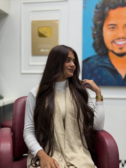 Another happy pose from our client, loving her new look. The color looks vibrant from every angle.