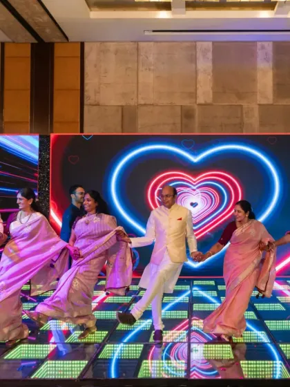 We love seeing families come together to celebrate. This performance, featuring parents and relatives dancing in perfect sync, showcases how our choreography can unite different generations on the dance floor, creating beautiful, shared memories.
