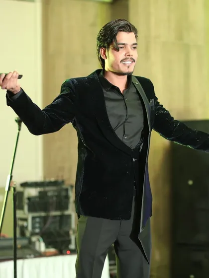 The energy of a live performance is electric. My job is to freeze that energy in a single frame, capturing the artist's passion and connection with the audience, even in tricky stage lighting.