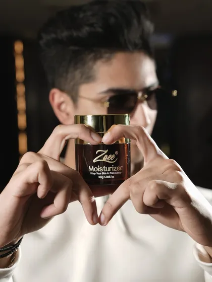 I believe in showing your skin some love. My luxurious moisturizer, held here in a heart shape, is the perfect way to give your skin the hydration and care it deserves.