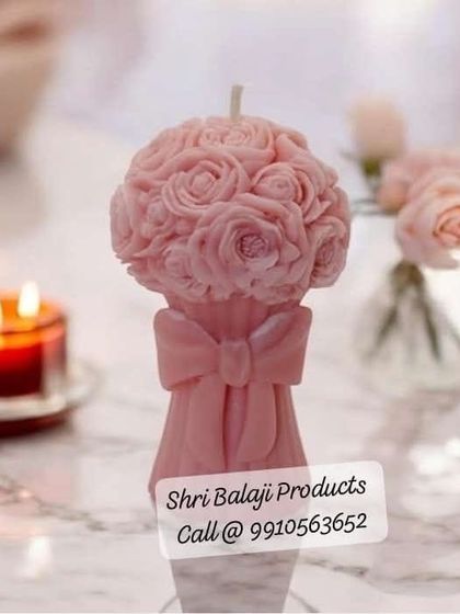 A delicate pink rose bouquet candle, shown in a soft, elegant setting. This mold is perfect for creating gifts for weddings, anniversaries, or just to show someone you care.