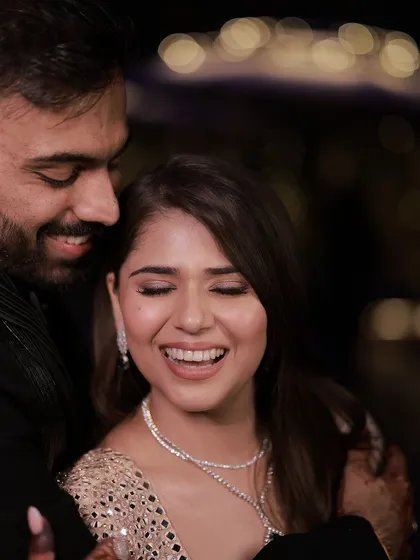 A beautiful, happy moment between the couple. Soft waves are perfect for creating these romantic, candid memories.
