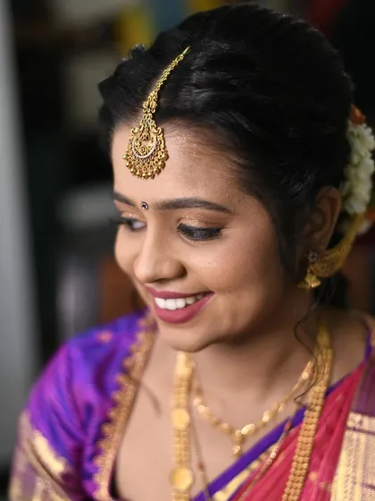 A close-up of this sweet client's engagement makeup. I used soft, earthy tones on her eyes and a subtle mauve lip, complemented by a traditional jasmine 'jade' in her hair for an authentic touch.