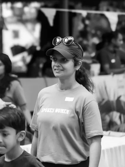 A volunteer looking on at the event, sporting the grey 'Spokes Women' tee. It's a classic and comfortable choice for our members.