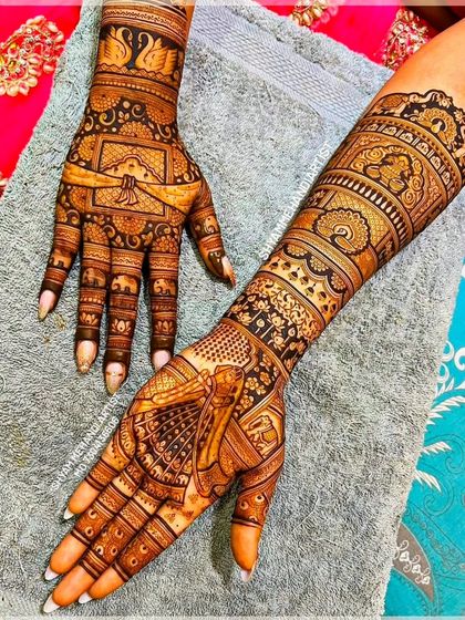 A unique design with a bride figure on one palm and a gatbandhan (wedding knot) motif on the other.